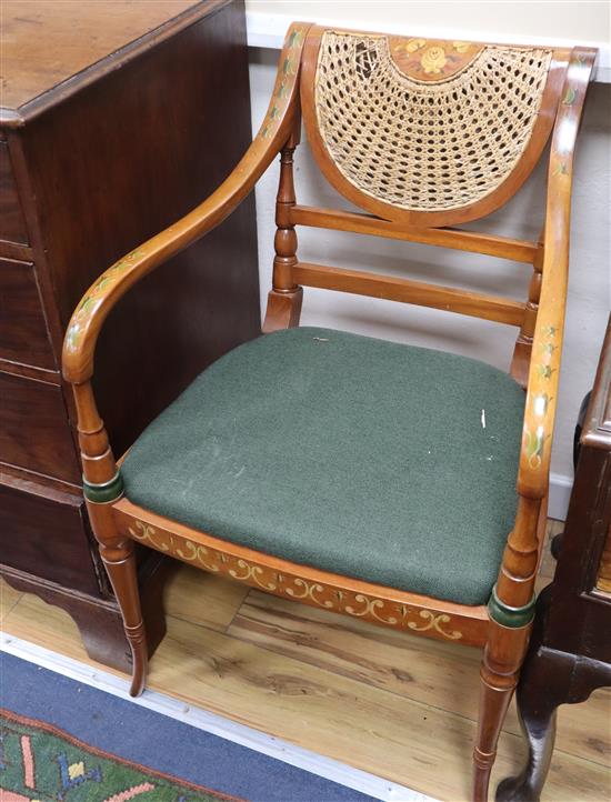 A pair of Sheraton design satinwood elbow chairs